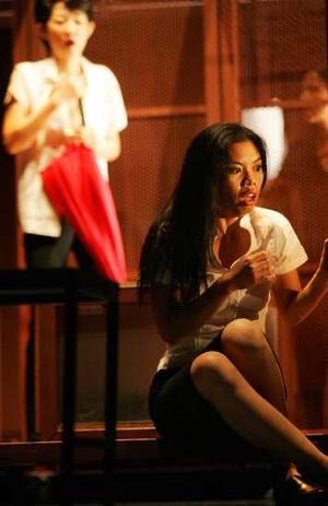 Ensemble still from Mobile, a multilingual devised work on migration in Southeast Asia.