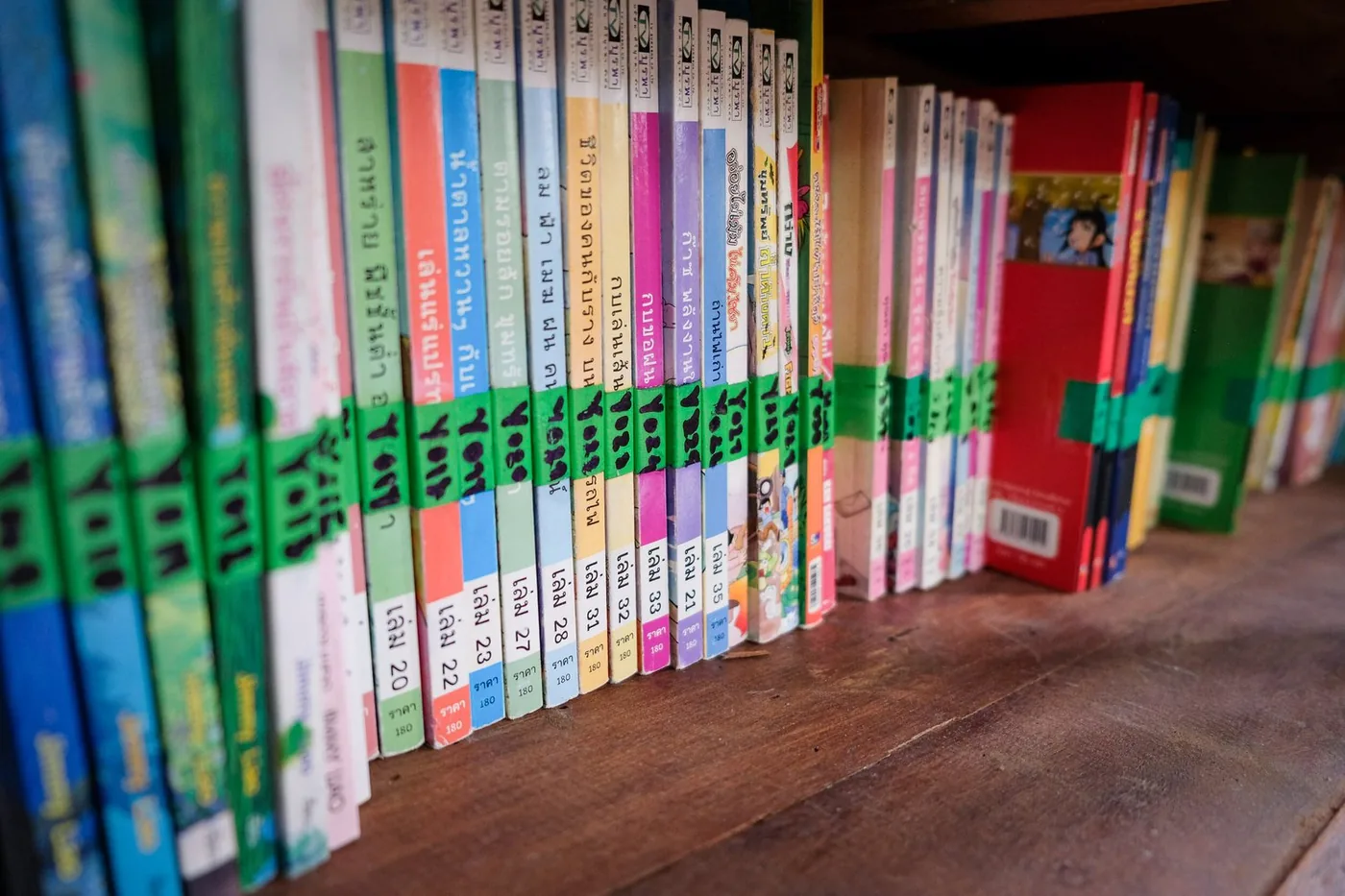 Shelves of well-read children's books at the LibLab library
